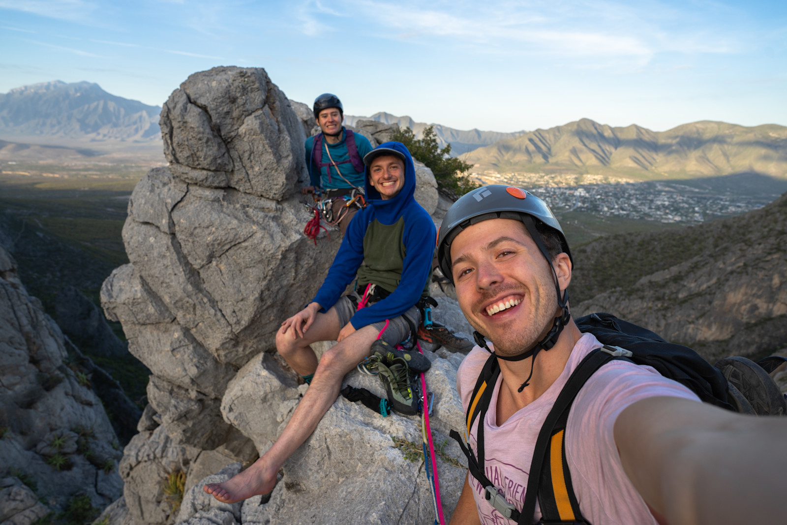 Celebrating the summit of a multi-pitch climb in El Potrero Chico, Mexico.