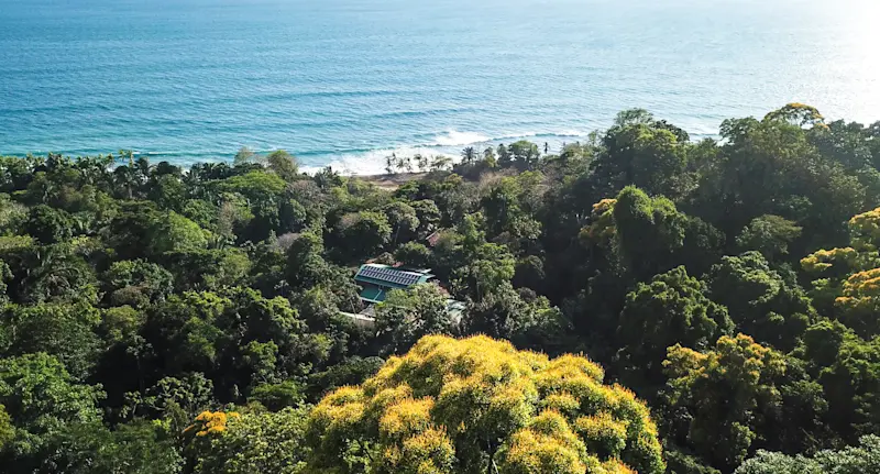 Aerial view of the lodge with a beach view