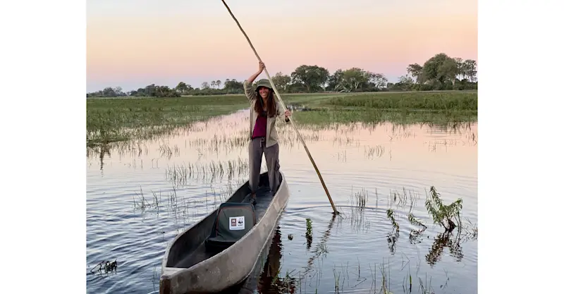 Padding a Mokoro canoe in Botswana.