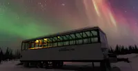 Nat Hab's Aurora Pod® underneath northern lights
