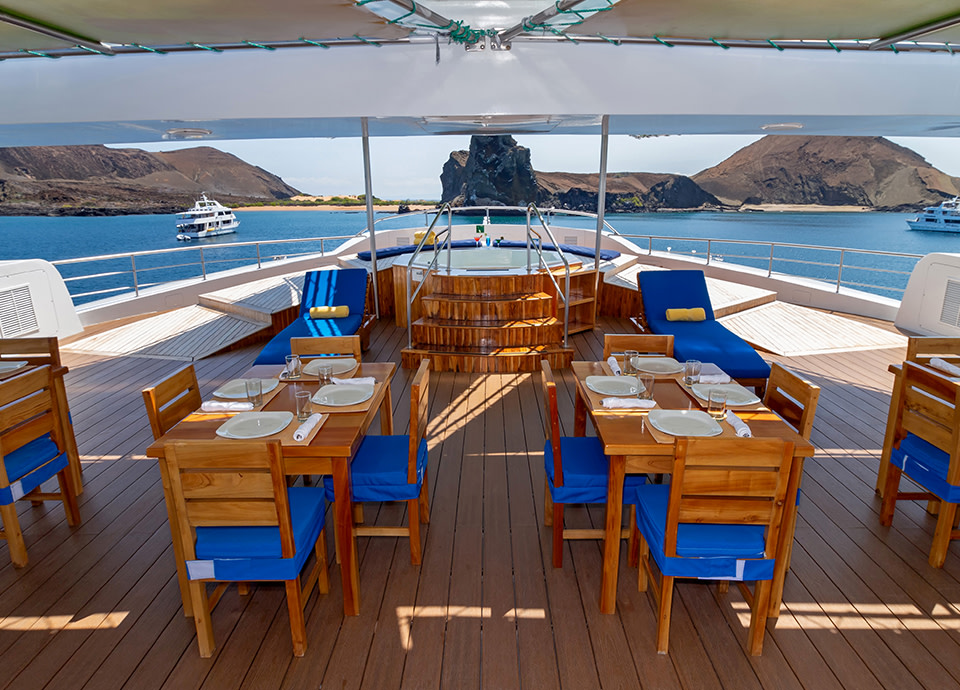 Outdoor dining area aboard the M/C Natural Habitat Petrel