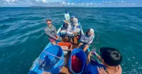 Earthwatch Expeditions crew sets longlines, Belize.