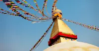A stupa in Kathmandu look upon the city in Kathmandu, Nepal.
