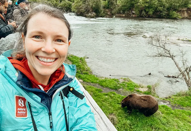 A selfie with the famous chunk in Brooks Falls, Alaska.
