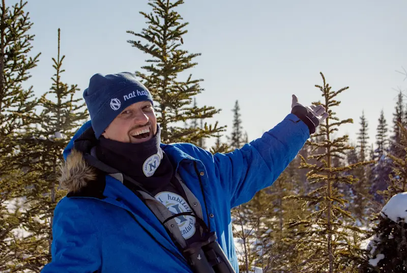 Adventuring across frozen tundra in search of snowy owls and gyrfalcons in Churchill, Manitoba.