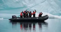 Zodiac ride through glaciers, East Greenland Arctic Adventure.