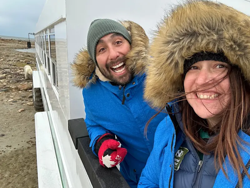 Viewing polar bears with my coworker in Churchill.