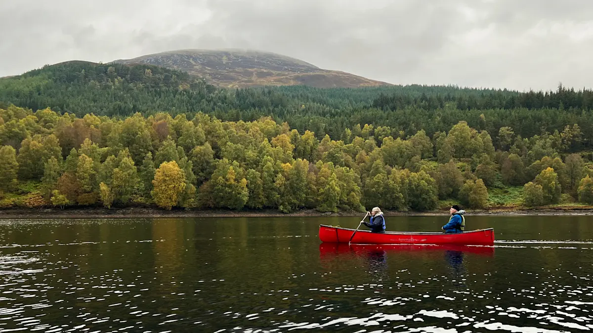 Nat Hab guests canoeing, Glen Affric Nature Reserve, Scotland.