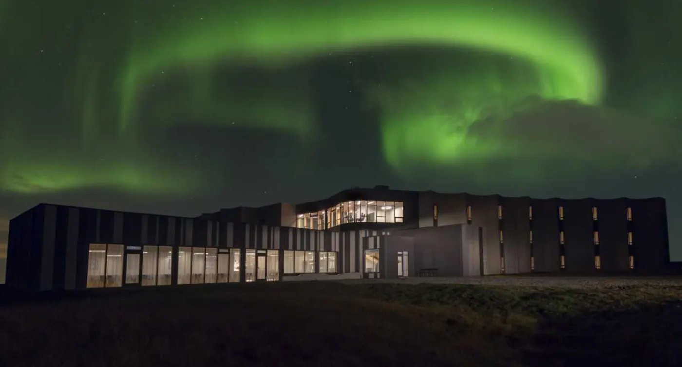 Hotel exterior under the Northern Lights