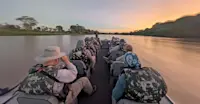 Nat Hab guests on private river cruise, Pantanal, Brazil.