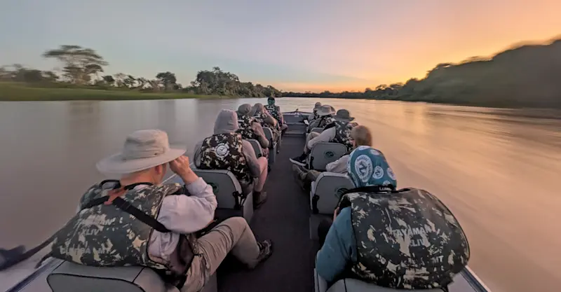 Nat Hab guests on private river cruise, Pantanal, Brazil.