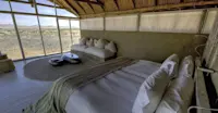 Bedroom at Little Kulala, Kulala Wilderness Reserve, Sossusvlei, Namibia.