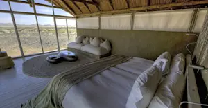 Bedroom at Little Kulala, Kulala Wilderness Reserve, Sossusvlei, Namibia.