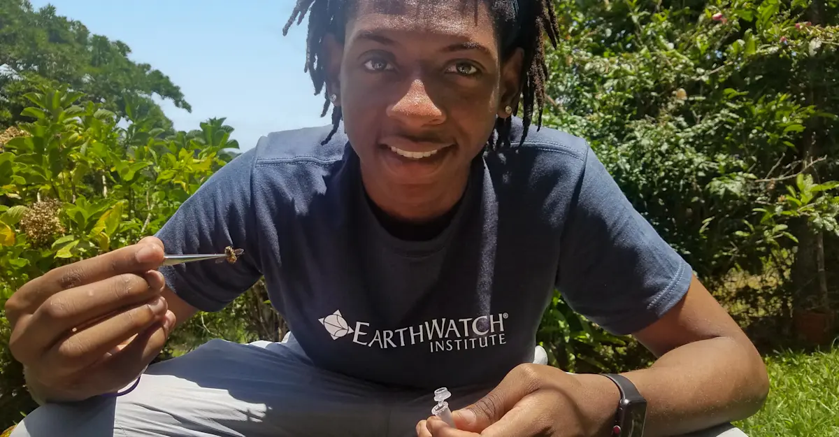 Earthwatch Expeditions guest collects a bee, Monteverde Cloud Forest Reserve, Costa Rica.