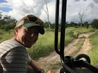 Following a leopard on the prowl in the Okavango Delta during green season in Botswana.