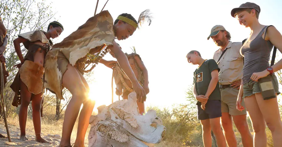 Kalahari bushmen and Nat Hab guests, Meno a Kwena, Botswana.