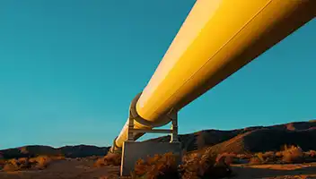 Natural gas pipeline in middle of a desert.
