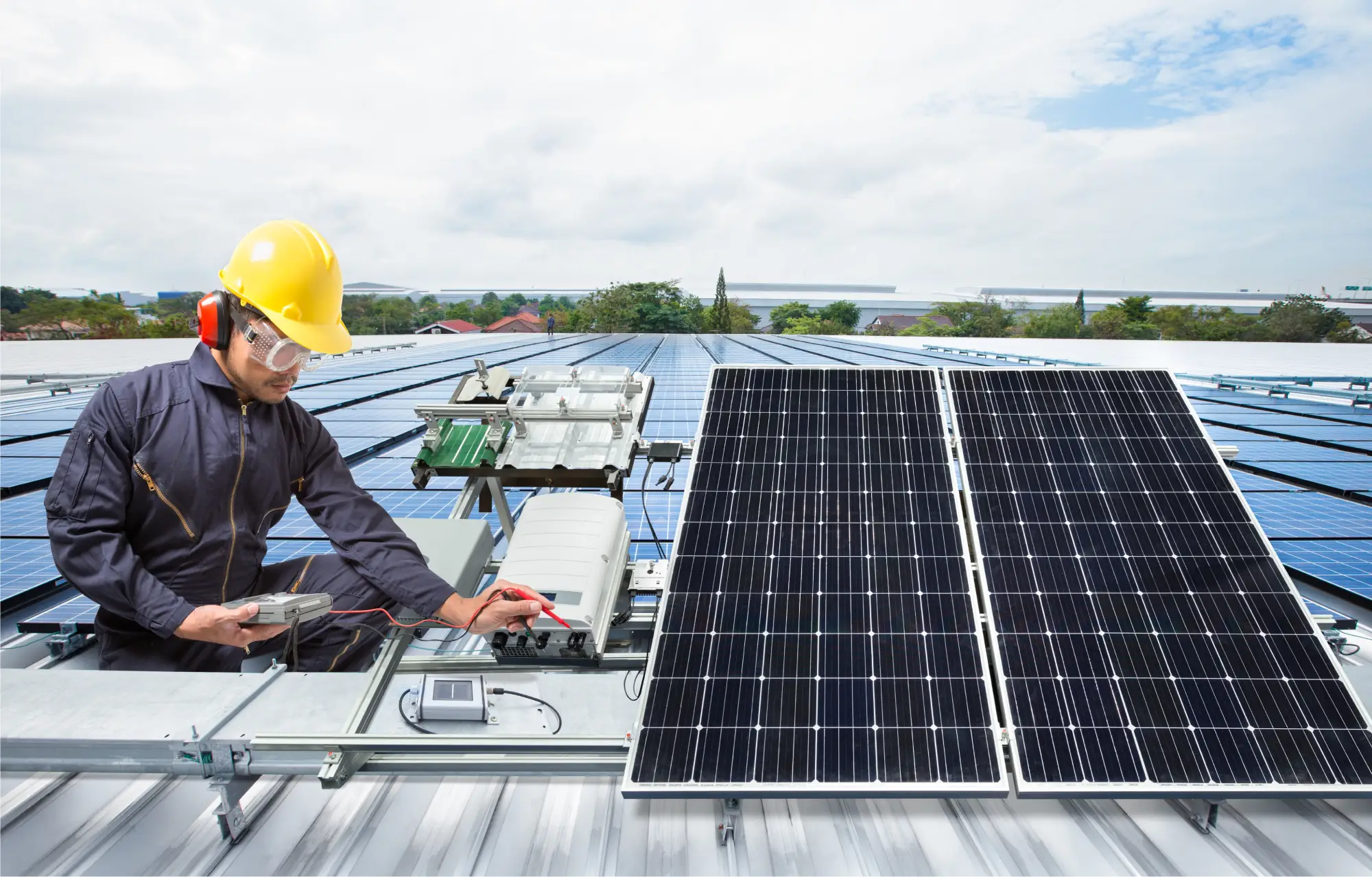 An engineer working on a solar panel