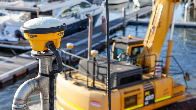 Close-up of a Trimble GA830 GNSS antenna being used for positioning in a marina