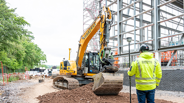Construction contractor using Trimble Earthworks machine control with ProPoint GNSS technology to overcome the challenging environment