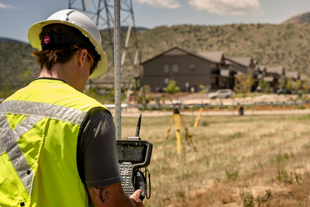 Surveyor in the field using a TSC510