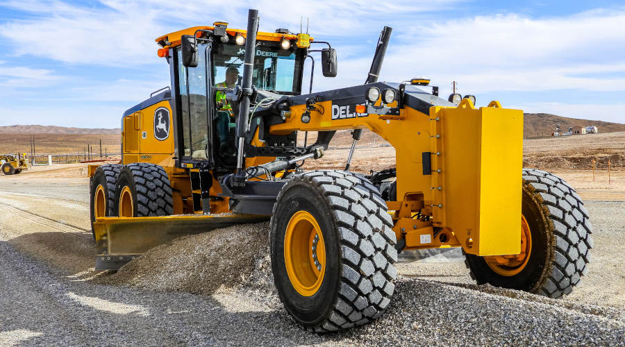CAT motor grader with mastless Trimble Earthworks on a construction site