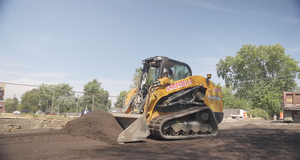 Wheel loader moving dirt on a jobsite