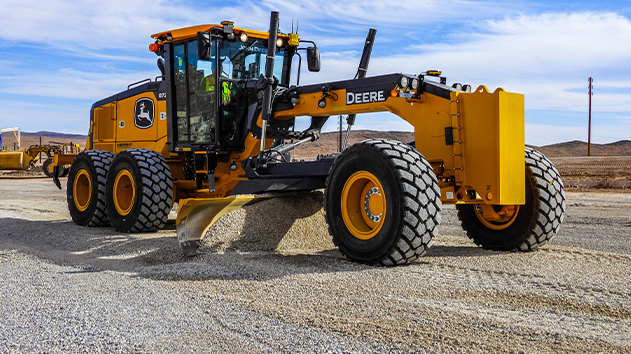 Deere motor grader with Trimble Earthworks Grade Control grading gravel