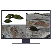Desktop monitor displaying Trimble Business Center software computing precise surfaces and volume stockpile quantities