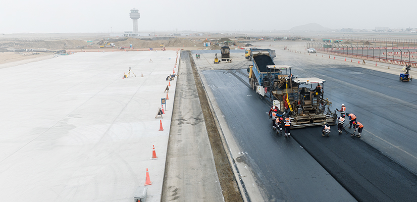 Team using Trimble paving control technology to lay asphalt on airport runway