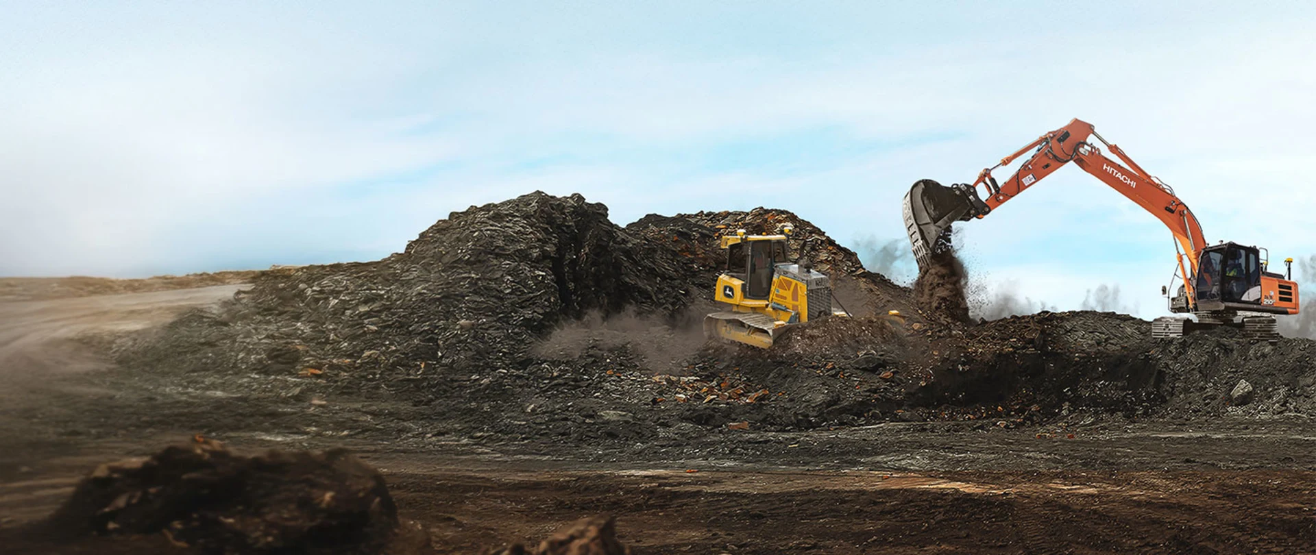 Trimble Earthworks Grade Control platform on dozer and excavator working on construction site.