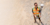 Surveyor in the field using GNSS surveying technology on a Trimble Works subscription.