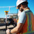 A surveying professional uses a Trimble data collector product to complete their work.