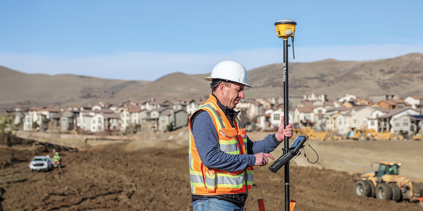 Contractor on a work site using the Trimble TSC710 controller
