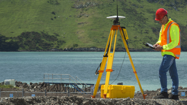 Surveyor using a zephyr 3 antenna near a bay