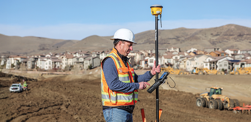 Contractor on a work site using the Trimble TSC710 controller
