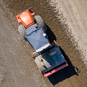 Aerial view of soil compactor using Trimble Earthworks Grade Control