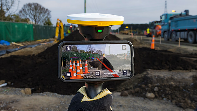 Trimble SiteVision augmented reality software displayed on a mobile phone enabling the accurate visualization of underground utilities in the field