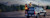 Man on the back of a truck adjusting an MX60 mobile mapping system on the roof of the truck