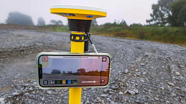 Trimble SiteVision augmented reality visualization being used to compare design plans to real-site conditions