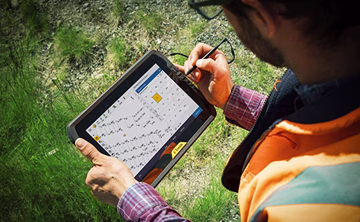 man holding tablet