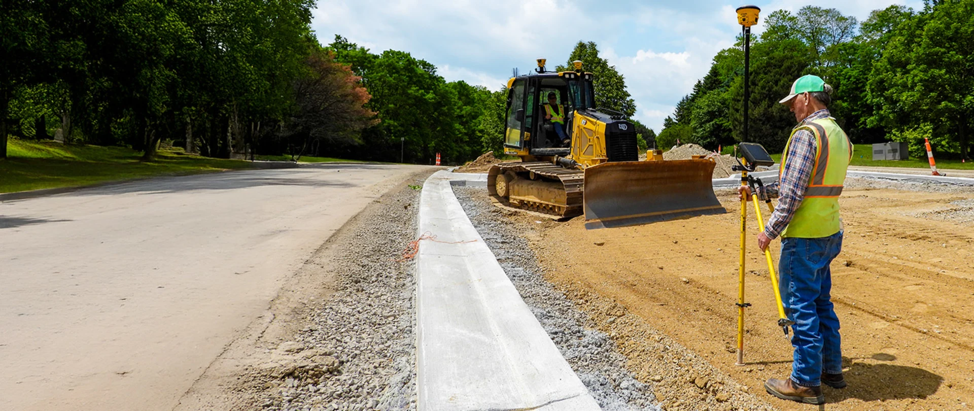 Construction crew utilizing their Trimble Works Plus subscription to ensure they have the latest Trimble technology on their paving project including the Trimble Earthworks grade control platform and Trimble Siteworks software