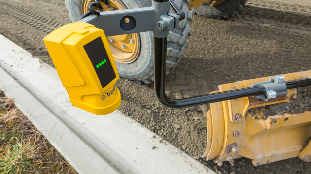 Trimble ST400 Sonic Tracer on the side of a machine