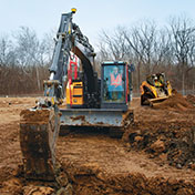 Excavator with Trimble Siteworks Machine Guidance operating on a construction site