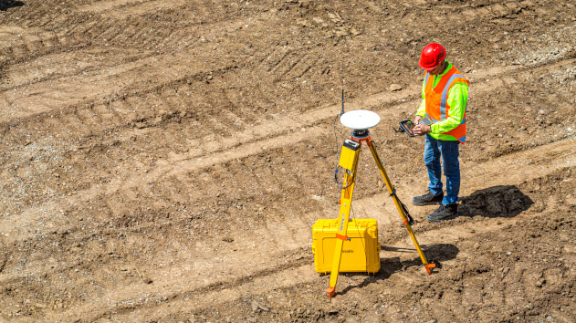 Surveyor using a R750 GNSS modular receiver with a TSC7 controller
