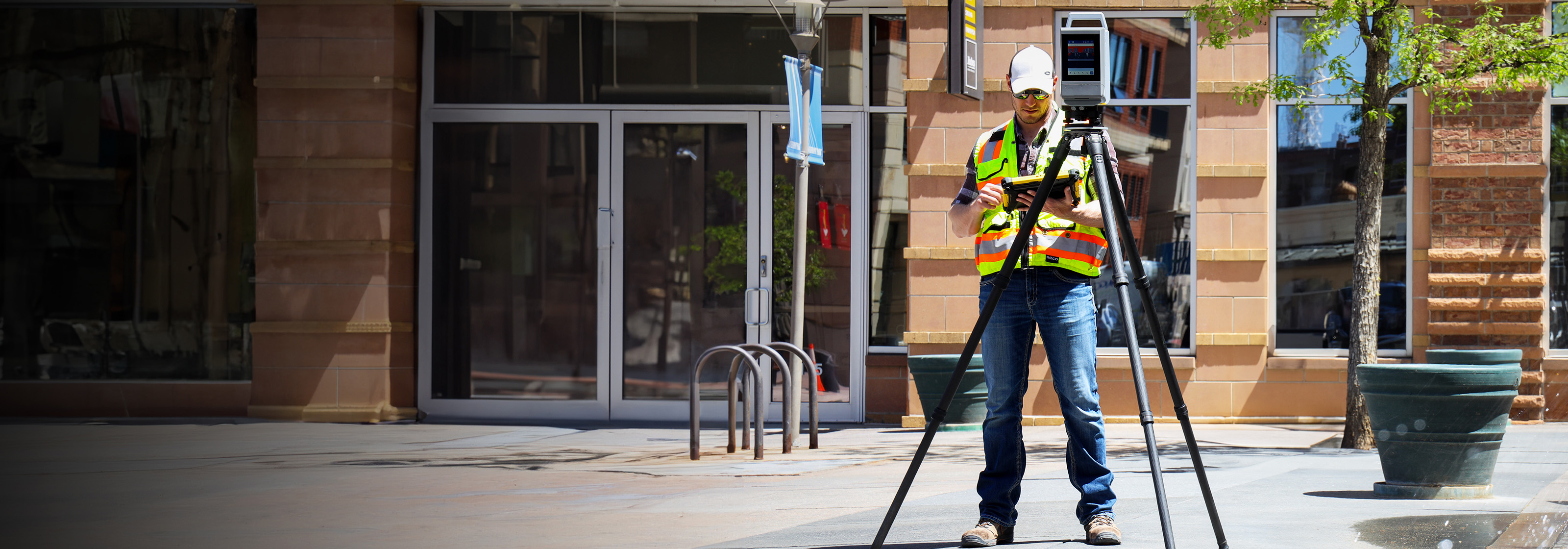 A surveying professional uses one of the Trimble laser scanning solutions.