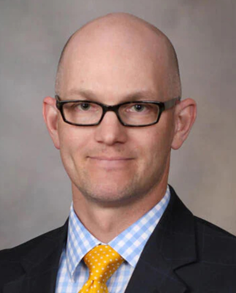 Headshot for Dr. Baum