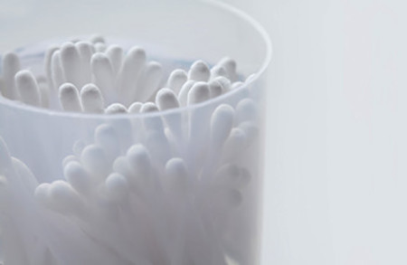 Clean cotton swabs for helping patients apply cold sore medication