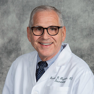 Headshot for Dr. Warren R. Heymann