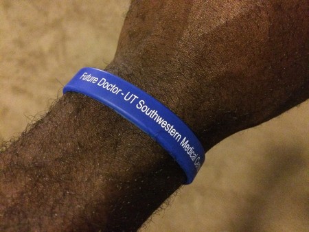 Students in the Pipeline Program are given a wristband